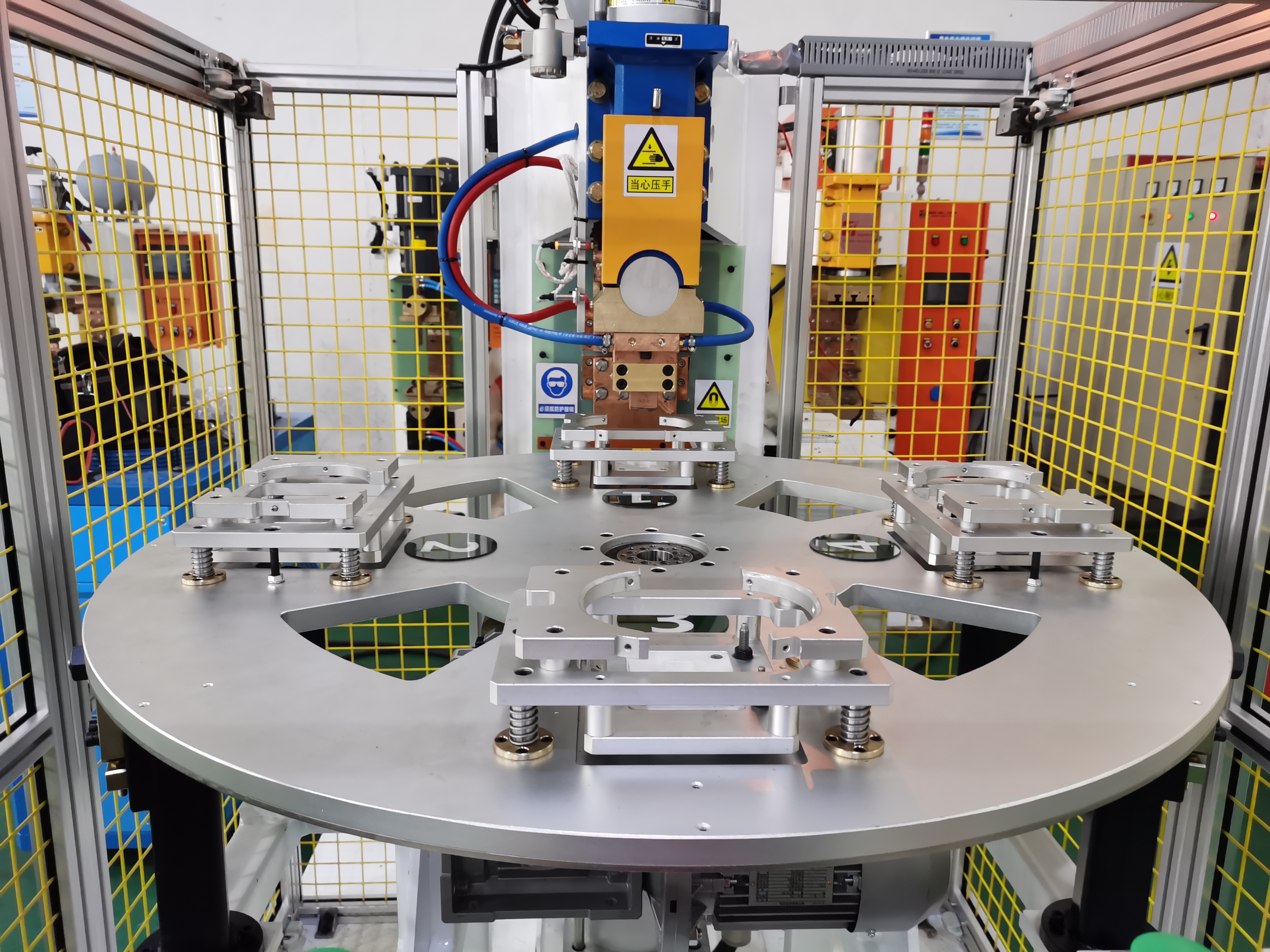 壓縮機(jī)殼體支架四工位凸焊機(jī)項(xiàng)目介紹 壓縮機(jī)殼體支架四工位凸焊機(jī)項(xiàng)目介紹